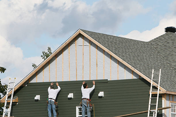 Professional Vinyl Siding technician working in Dunlevy, PA
